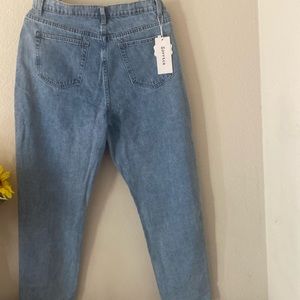 Light washed jeans. Have rip in knee. Brand new NEVER BEEN WORN.